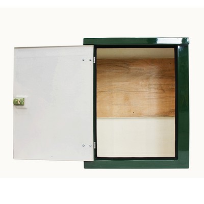 Picture of Green GRP Kiosk c/w single door/backboard/lock. 1150x945x500mm (HxWxD)